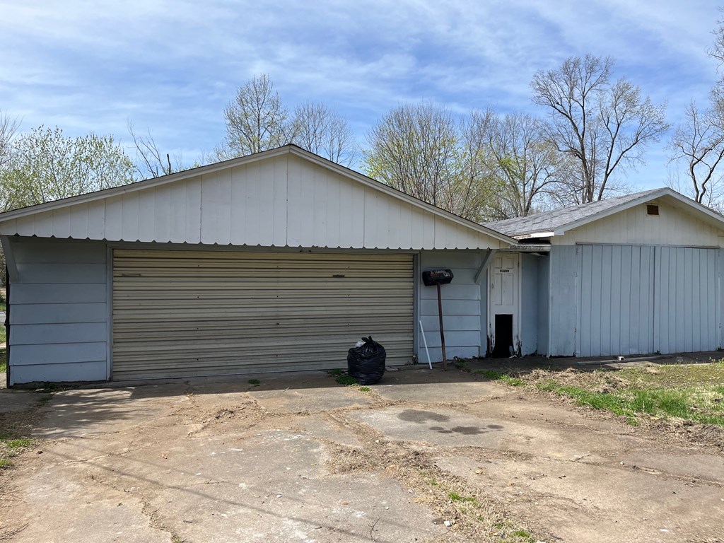 Detached garage and shed